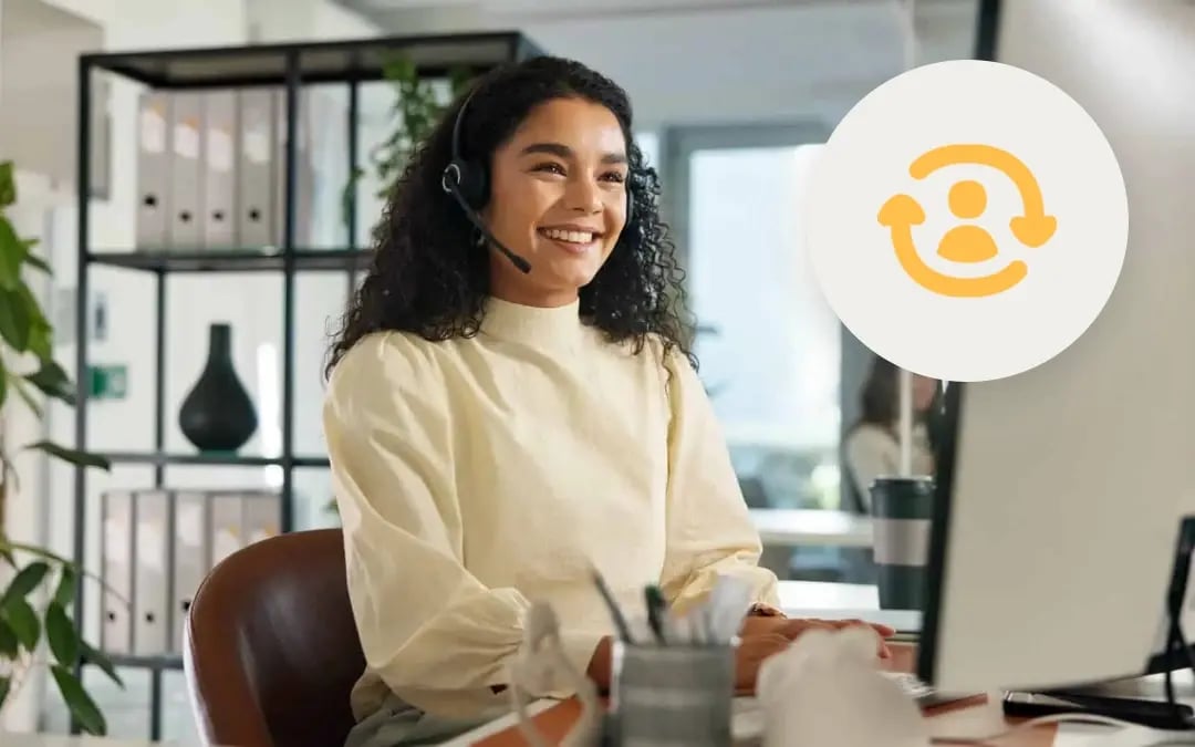 Contact center agent on call wearing headset smiling with yellow person icon