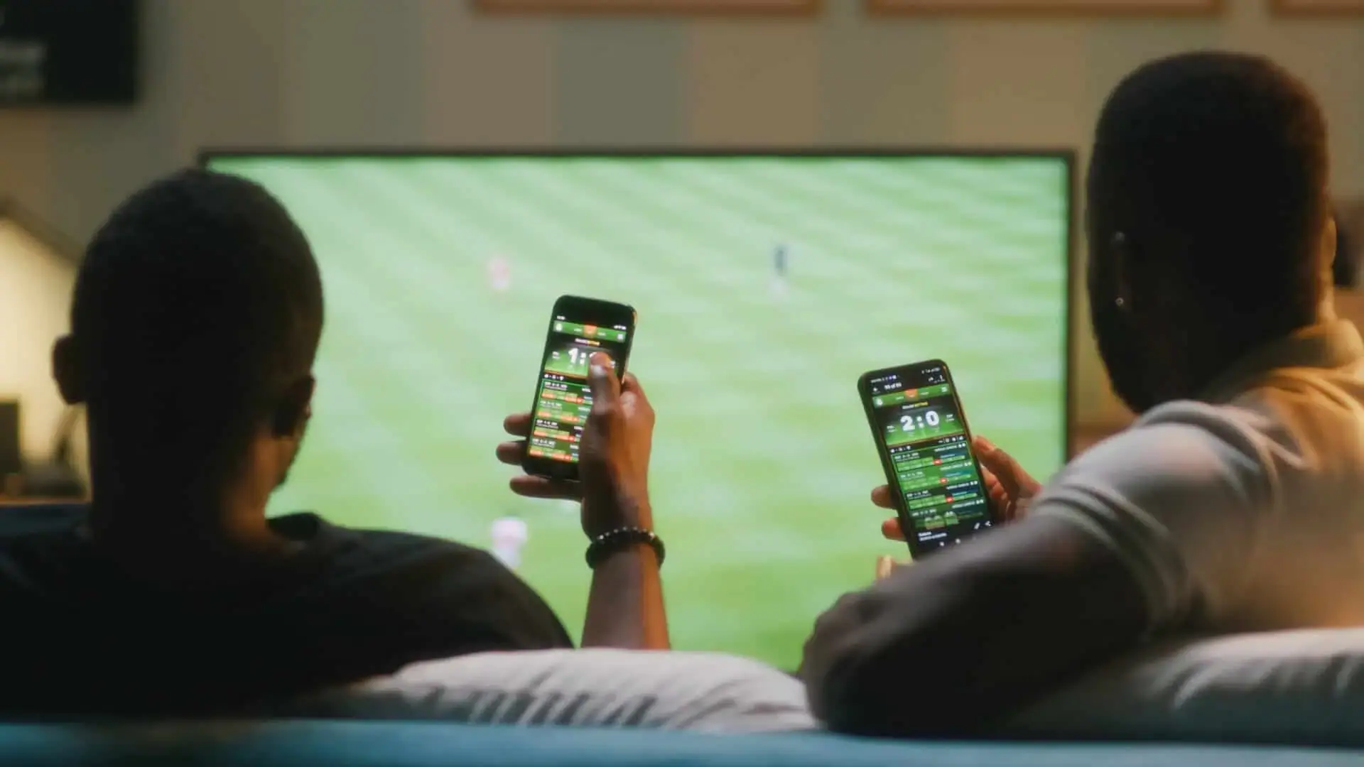 People watching sports on mobile devices