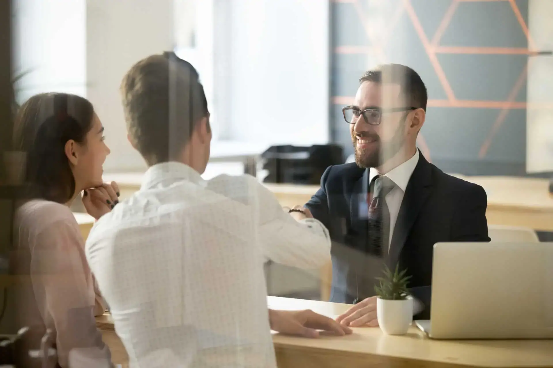 Finance professional in a meeting with customers