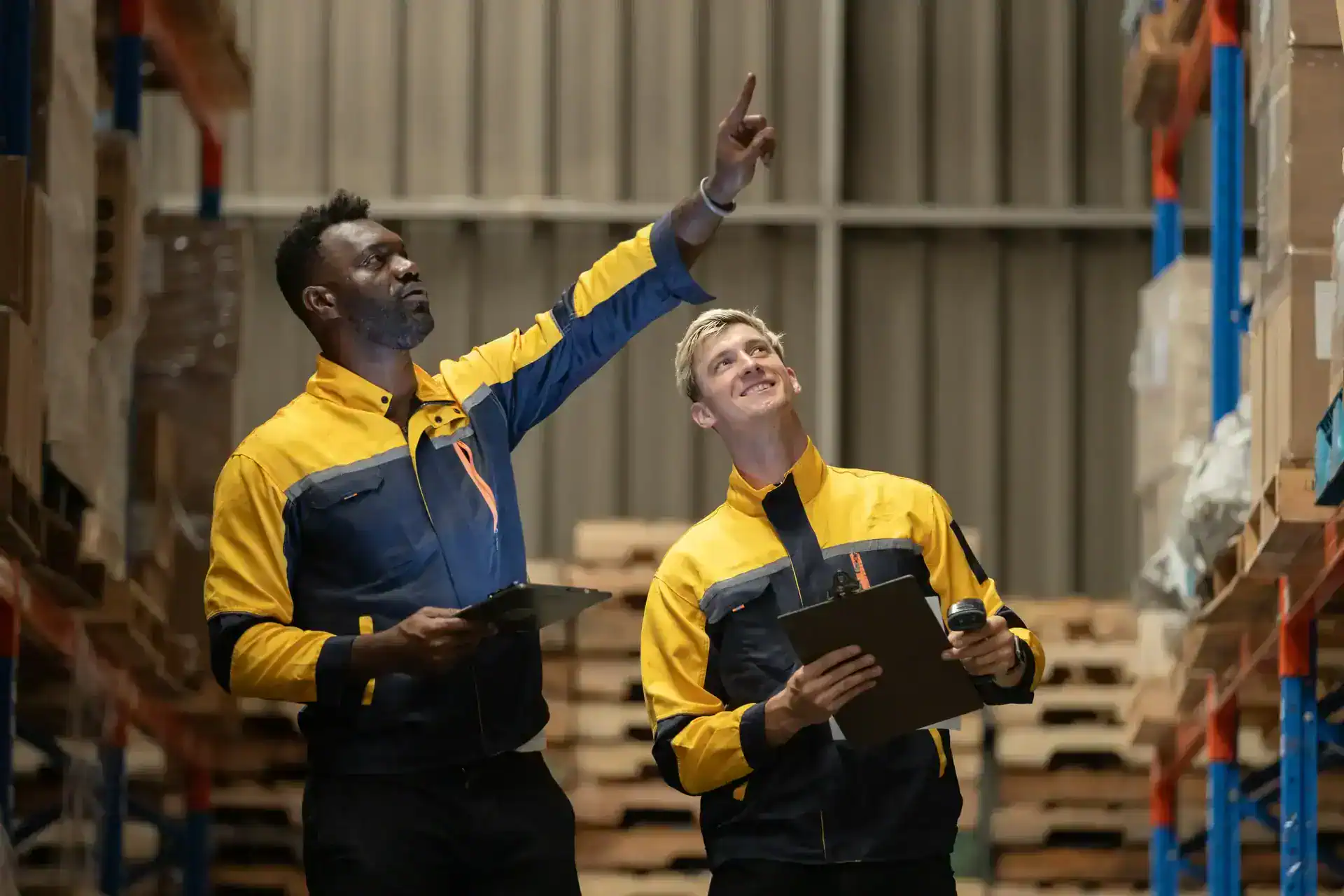 Warehouse staff inspecting inventory