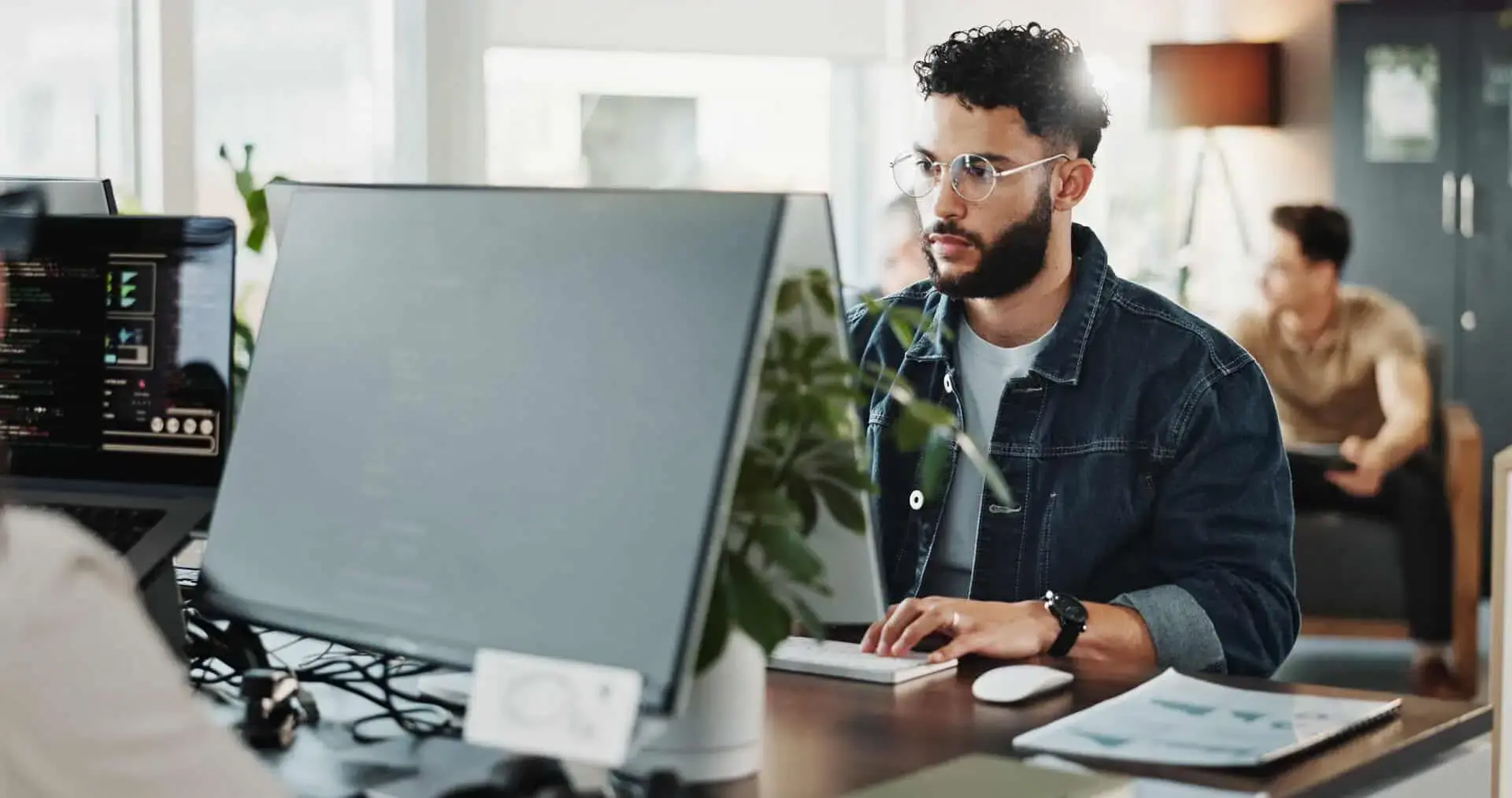 Professional man working on a computer