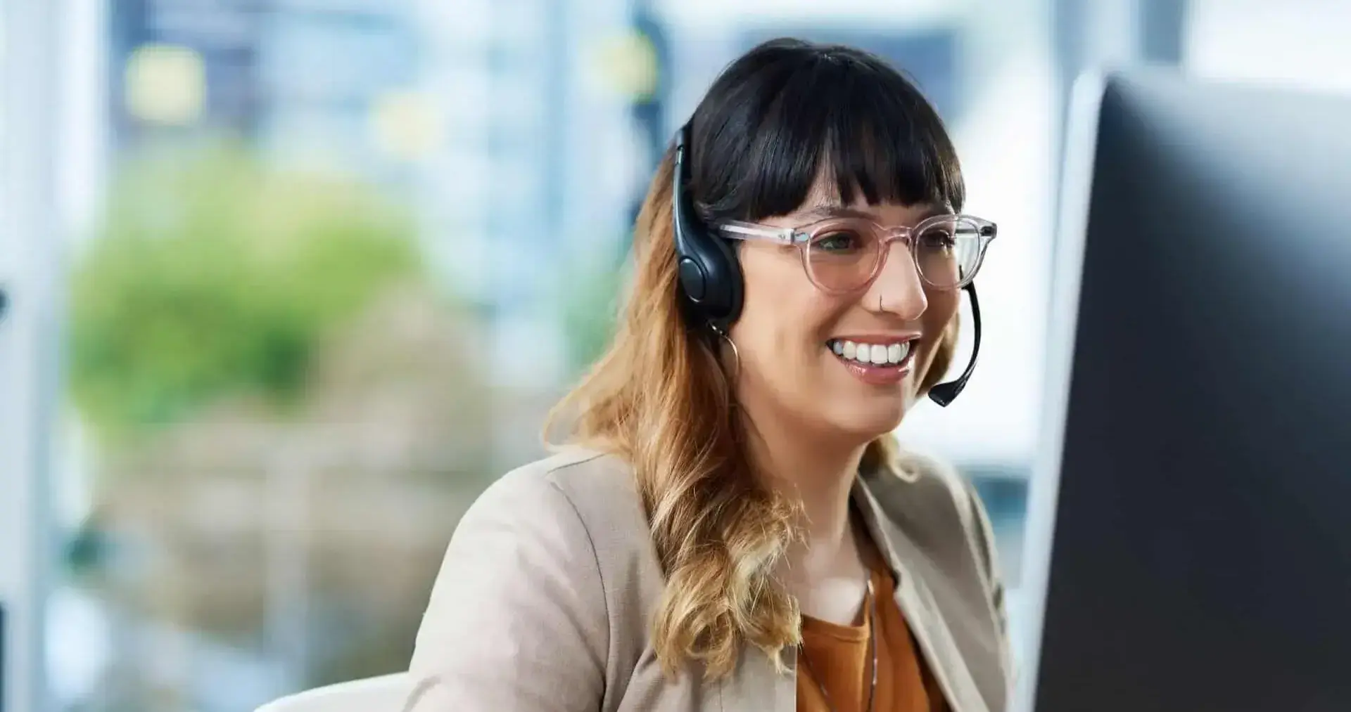 Agent happy on call wearing headset