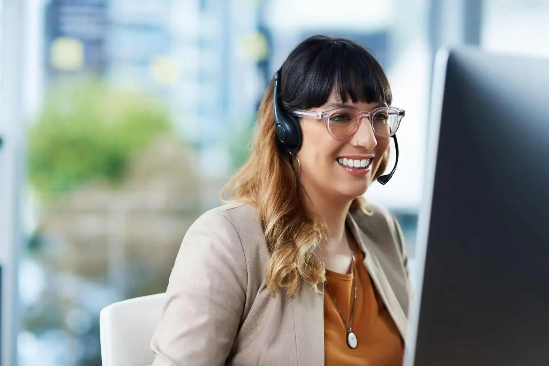 Contact center agent smiling during a call