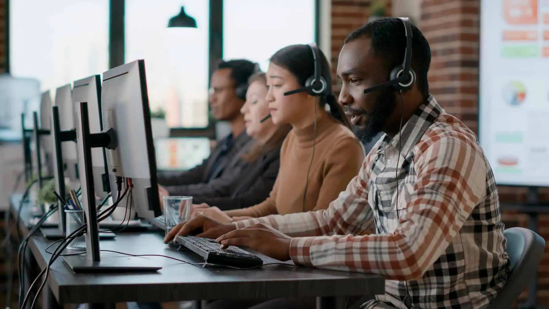 Contact center agent speaking on a headset
