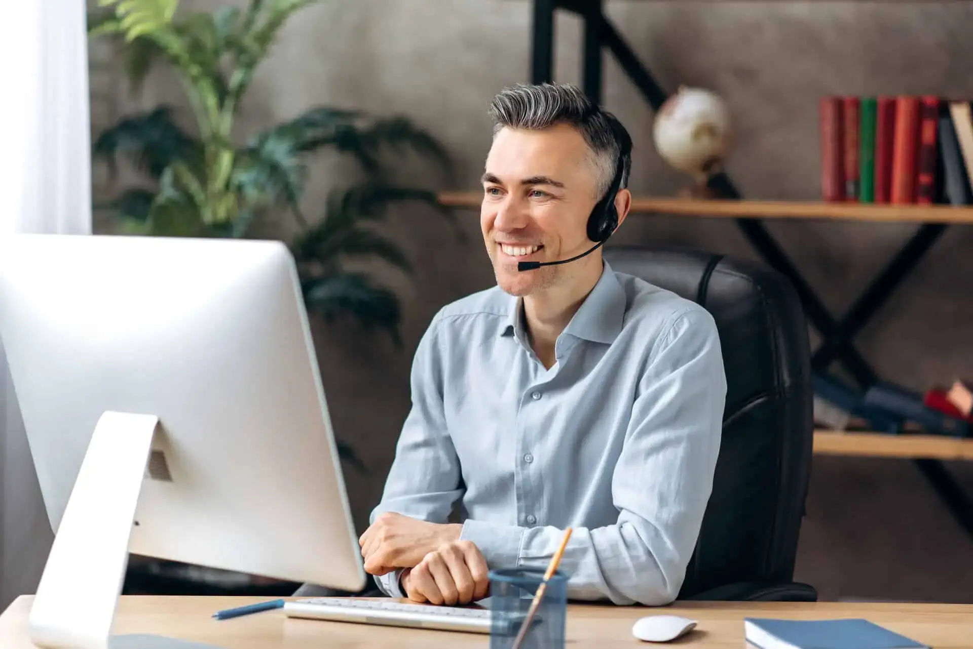 Customer service agent working at a computer