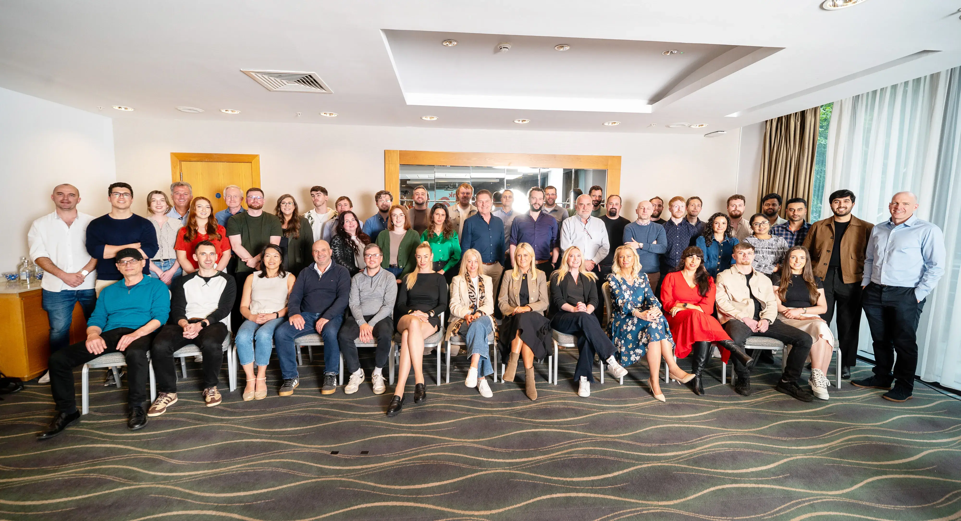 A photograph of the ScorebuddyCX team